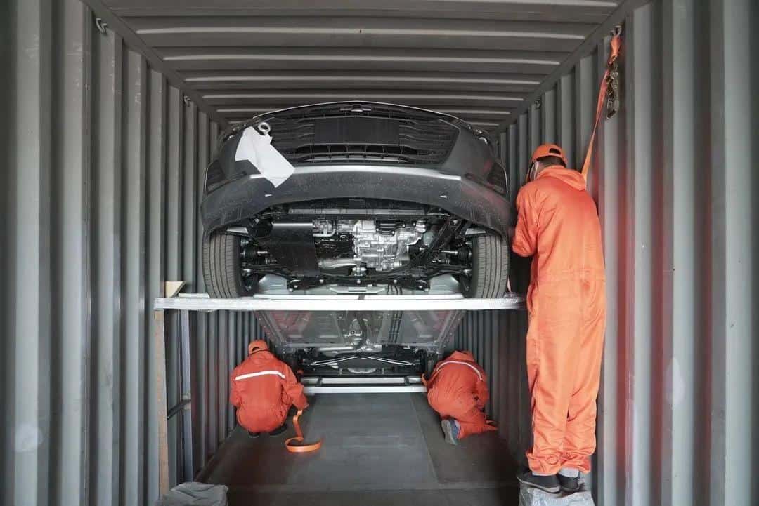 Vehicle being lashed inside a shipping container